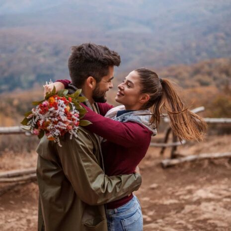 couple-hugging-while-standing-viewpoint (1)